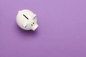 piggy bank on purple background