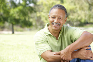 Man in park smiling